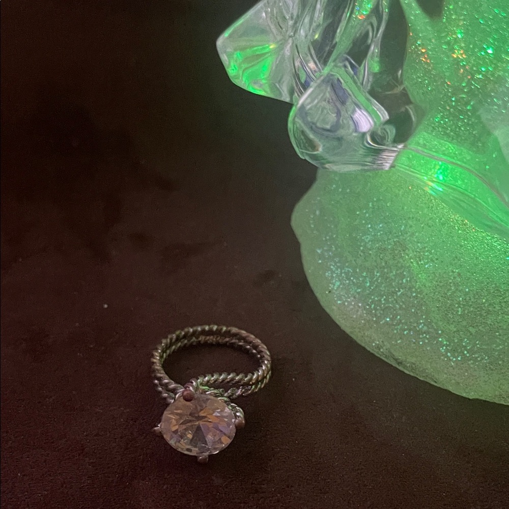 Elegant Silver-Toned Ring with Clear Gemstone